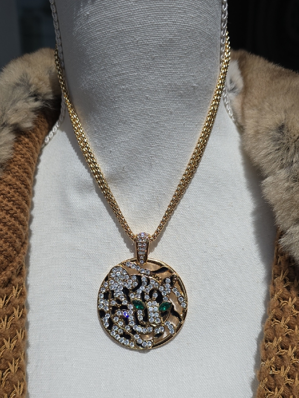 Gold-Tone Filigree Pendant Necklace with Green Accents